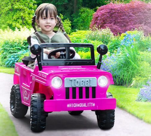 A kid is riding the jeep for kids.